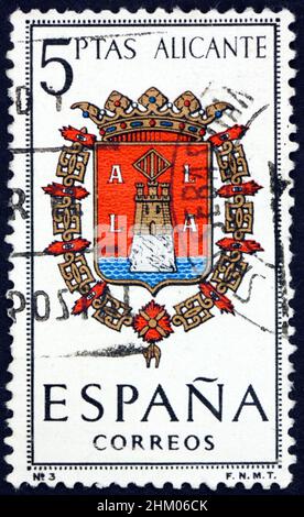 SPANIEN - UM 1962: Eine in Spanien gedruckte Briefmarke zeigt Arms of Alicante, Provincial Arms, um 1962 Stockfoto