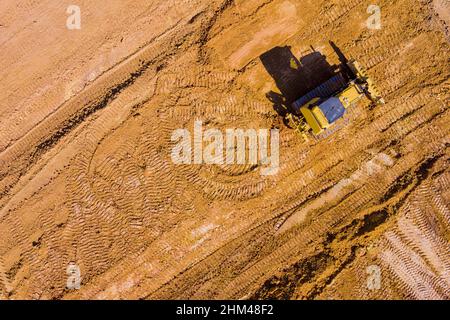 Grader Bau Grader Industriemaschine auf dem Bau des Neubaus eines Motor Grader in den Prozess der Nivellierung Stockfoto