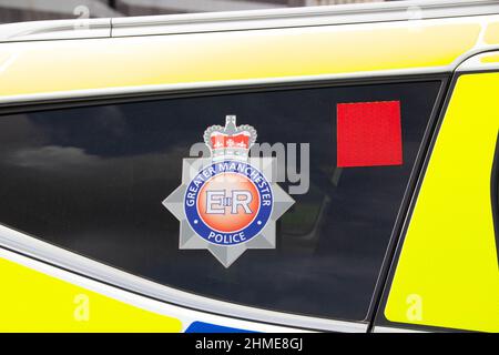 Greater Manchester Police Abzeichen auf einem Fenster Stockfoto