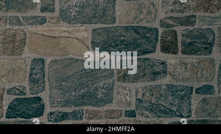 Rustikaler und gealterter Wandstein, Außenwand Stockfoto