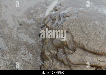 Gefrorener Sand im Indiana Dunes National Park West Beach. Stockfoto