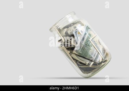 Glasglas Dollar. Modell. Speicherplatz kopieren. Economy-Konzept. Stockfoto