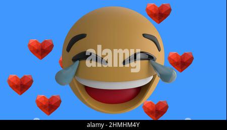 Lachendes Gesicht Emoji über mehrere rote Herz-Symbole schweben auf blauem Hintergrund Stockfoto