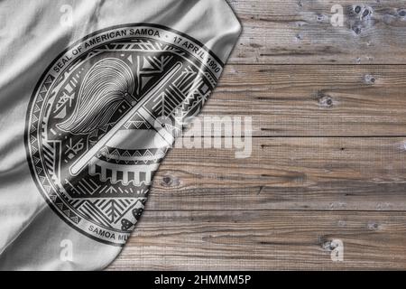 United States Country State Seal American Samoa auf altem Holzmuster Tischbrett Stockfoto