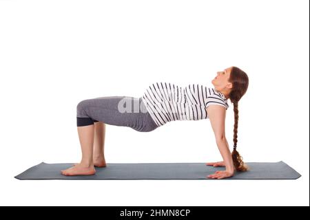 Schwanger Frau tun Yoga Asana Purvottanasana Stockfoto