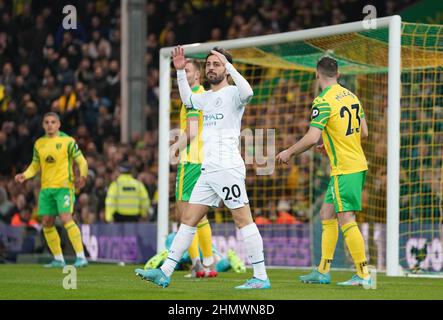 Bernardo Silva von Manchester City reagiert nach einer verpassten Gelegenheit während des Spiels in der Premier League in Carrow Road, Norwich. Bilddatum: Samstag, 12. Februar 2022. Stockfoto