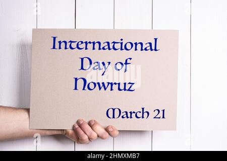 Ein Schild zum Internationalen Tag der Vereinten Nationen von Nowruz am 21. März. Stockfoto