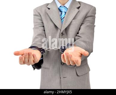 Besorgt kaukasischen Geschäftsmann mittleren Alters in Handschellen . Studioaufnahme. Weißer Hintergrund Stockfoto