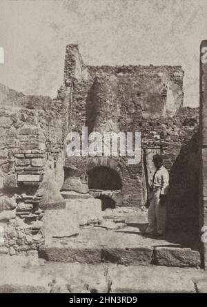 Amerikanischer Bürgerkrieg. Afroamerikanischer Soldat in Uniform am zerstörten Kamin oder Ofen, möglicherweise in Fort Sumter. USA. Zwischen 1863-1865 Stockfoto