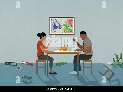 Das Wasser steigt über das vergessenen Paar, das am Tisch ein Truthahn-Abendessen isst Stockfoto