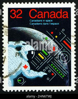 KANADA - UM 1985: Eine in Kanada gedruckte Marke zeigt Astronaut, Kanadier im All, um 1985 Stockfoto