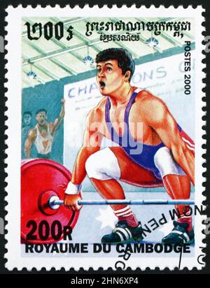 KAMBODSCHA - UM 2000: Eine in Kambodscha gedruckte Marke zeigt Gewichtheben, Sport, um 2000 Stockfoto