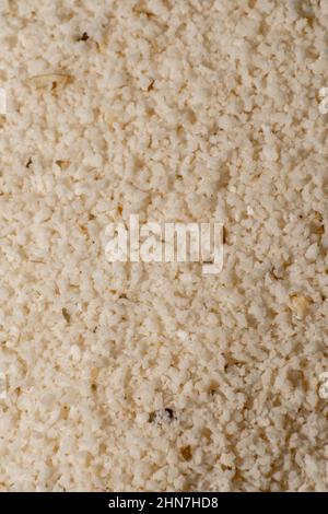 Lebensmittel Gewürze Nahaufnahme Fotografie, Aromen von kulturellen Speisen. Kochen mit Geschmack. Zerdrückter Knoblauch. Stockfoto