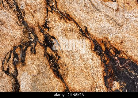 New Sedna - Granit Hintergrund, Textur in idealen Goldton für Ihre kreative Design-Arbeit. Stockfoto