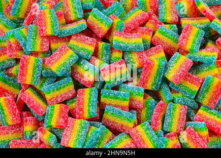 Rainbow saftig gummy Süßigkeiten Hintergrund. Draufsicht. Gelee-Süßigkeiten. Stockfoto