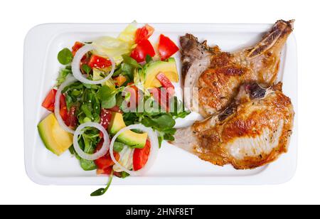 Gebratener Schweinelende mit Salat Stockfoto