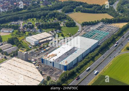 Luftaufnahme, Industriegebiet InlogParc an der Autobahn A2 mit Baustelle und Neubau des Logistikzentrums Poco in Westerbonen, Bönen Stockfoto