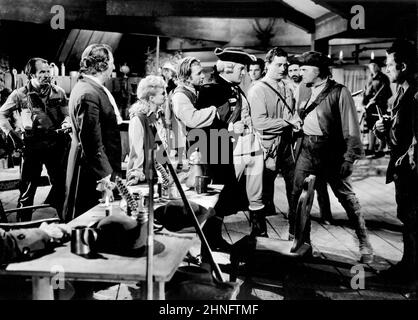 Claire Trevor, George Sanders, John Wayne, am Set des Films, „Allegheny Uprising“, RKO Radio Picches, 1952 Stockfoto