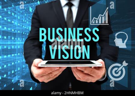 Text mit Inspiration Business Vision, Word Geschrieben auf Wachstum Ihres Unternehmens in der Zukunft auf der Grundlage Ihrer Ziele man in Office Uniform Holding Tablet Di Stockfoto
