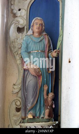 St. Elisabeth von Ungarn, Statue auf dem Altar der Heiligen drei Könige in der Kirche unserer Lieben Frau vom Schnee in Volavje, Kroatien Stockfoto