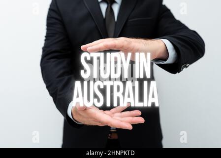 Textunterschrift Präsentation der Studie in Australien, Wort für den Weg ins Ausland bestellen Vervollständigen Sie Ihr Studium Präsentation neuer Pläne und Ideen Demonstrati Stockfoto
