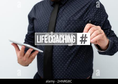 Schild mit Life Coaching, Geschäftsidee Mitarbeiter, die zeigen, wie sie ihre Ziele in ihrer Karriere erreichen können Präsentation neuer Technologieideen Diskussion T Stockfoto