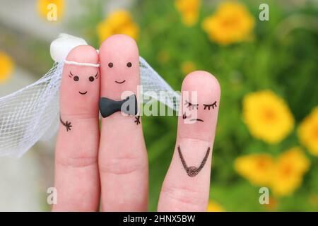 Finger Kunst des glücklichen Paares zu heiraten. Andere Frau umgekippt. Stockfoto