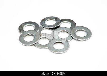 Ein Stapel von 18mm Unterlegscheiben des Hintergrundbildes Stockfoto