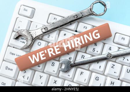 Handwriting Text We Re Hiring, Business Concept Kürzlich jemanden einstellen oder jemanden bezahlen, um bestimmte Aufgaben zu erledigen Abstract Fixing veraltete Websites, maintai Stockfoto