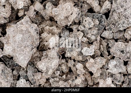 Silbernitratkristalle mit rosa bräunlichem Farbton nach teilweiser Lichteinwirkung, Mikroskopie Detail Bildbreite 17mm. Stockfoto