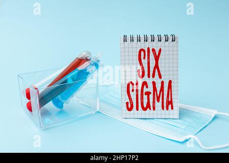 Handschriftentext Six Sigma, Geschäftskonzept Satz von Managementtechniken zur Verbesserung von Geschäftsprozessen Schreiben wichtiger medizinischer Notizen Laborat Stockfoto