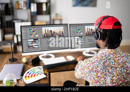 African American Video Editor Tech Job Mit Computer Stockfoto