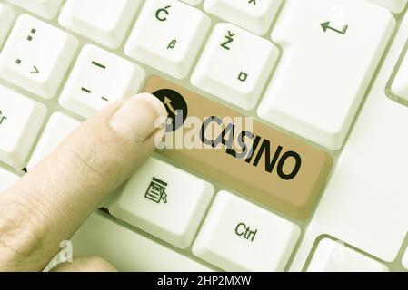 Handschrift Text Casino, Konzept bedeutet ein Gebäude, in dem Spiele vor allem Roulette und Kartenspiele gespielt werden Recherche Software Development Solutio Stockfoto