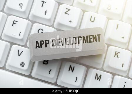 Textunterschrift präsentiert App-Entwicklung, Geschäftsübersicht Entwicklungsdienste für großartige mobile und Web-Erfahrungen Abstract Typing Präsentation Me Stockfoto