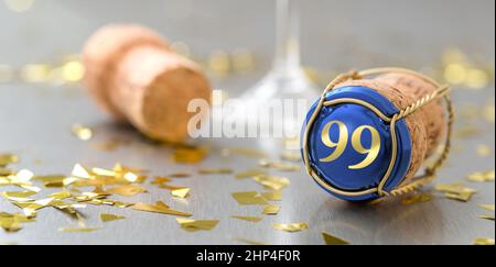 Champagnerkappe mit der Nummer 99 Stockfoto
