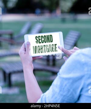 Textschild mit zweiter Hypothek, Business Showcase Pfandrecht auf Grundstück, das einer höherrangigen Voice- und Video-Telefonie-Fähigkeiten Con untergeordnet ist Stockfoto