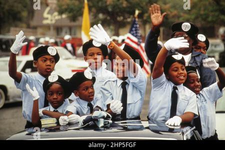 Austin Texas USA, 1993: Mitglieder der Black Bible-Klasse winken zu Menschenmengen, während sie in einer Veteran's Day Parade durch die Innenstadt reiten. ©Bob Daemmrich Stockfoto