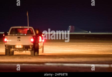 Die Boeing CST-100 Starliner landet am Sonntag, den 22. Dezember 2019 in White Sands, New Mexico. Die Landung schließt einen abgekürzten Orbital-Flugtest für das Unternehmen ab, der noch mehrere Missionsziele für das Commercial Crew-Programm der NASA erfüllt. Stockfoto