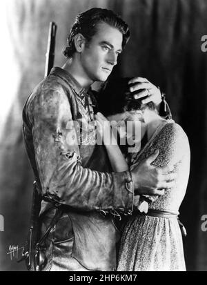 Werbefoto von John Wayne und Marguerite Churchill für den 1930 Western The Big Trail Stockfoto