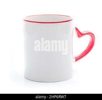 Weiße Tasse mit Rot in Herzform Griff Stockfoto