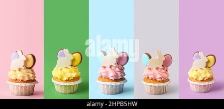 Set von leckeren Oster-Cupcakes auf farbigem Hintergrund Stockfoto