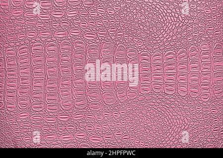 Rosa Krokodilleder-Textur. Abstrakter Hintergrund für Design. Stockfoto