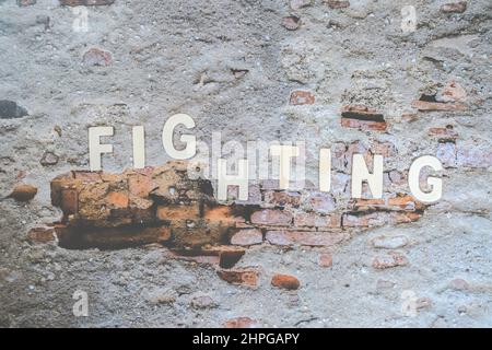 Das Kampfwort an der Wand. Image des Geschäftskonzepts. Erwartungsvorhersage Konzept Der Hope-Strategie-Planung. Stockfoto