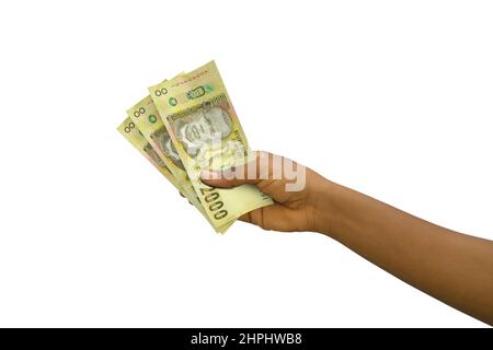 Fair Hand Holding 3D gerendert 2000 Malawische Kwacha Noten isoliert auf weißem Hintergrund Stockfoto