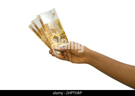 Fair Hand hält 3D gerenderte CFP-Notizen isoliert auf weißem Hintergrund Stockfoto