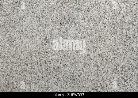 Metallisierter grauer Hintergrund, Oberfläche mit Kornstruktur, Nahaufnahme der Textur, Kopierraum Stockfoto