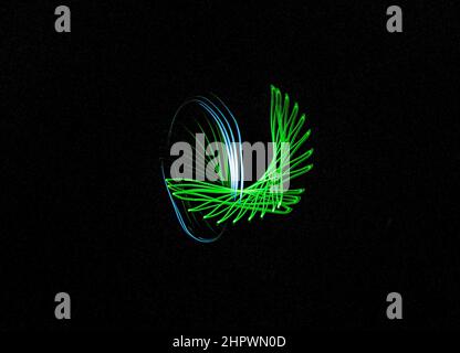 Kreisel, dunkler Hintergrund, geometrische Form, abstrakte Figuren, Lichtspiel, Bewegung, Pendelfotografie, Baden-Baden, Baden-Württemberg Stockfoto