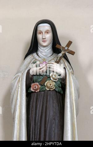 Heilige Teresa, Statue auf dem Altar des Unbefleckten Herzens Mariens in der Pfarrkirche St. Matthäus in Garcin, Kroatien Stockfoto