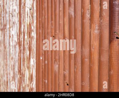 Gartenzaun neu und alt gestrichen Stockfoto