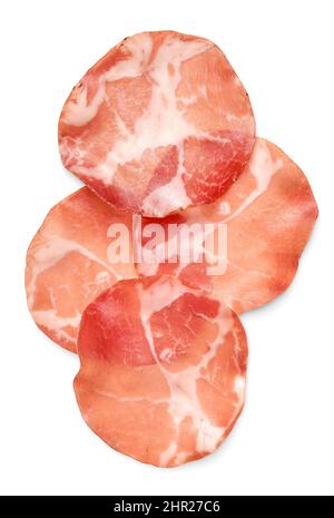 Essen und Trinken: Dünne Scheiben ausgehärtetes Schweinefleisch, isoliert auf weißem Hintergrund Stockfoto